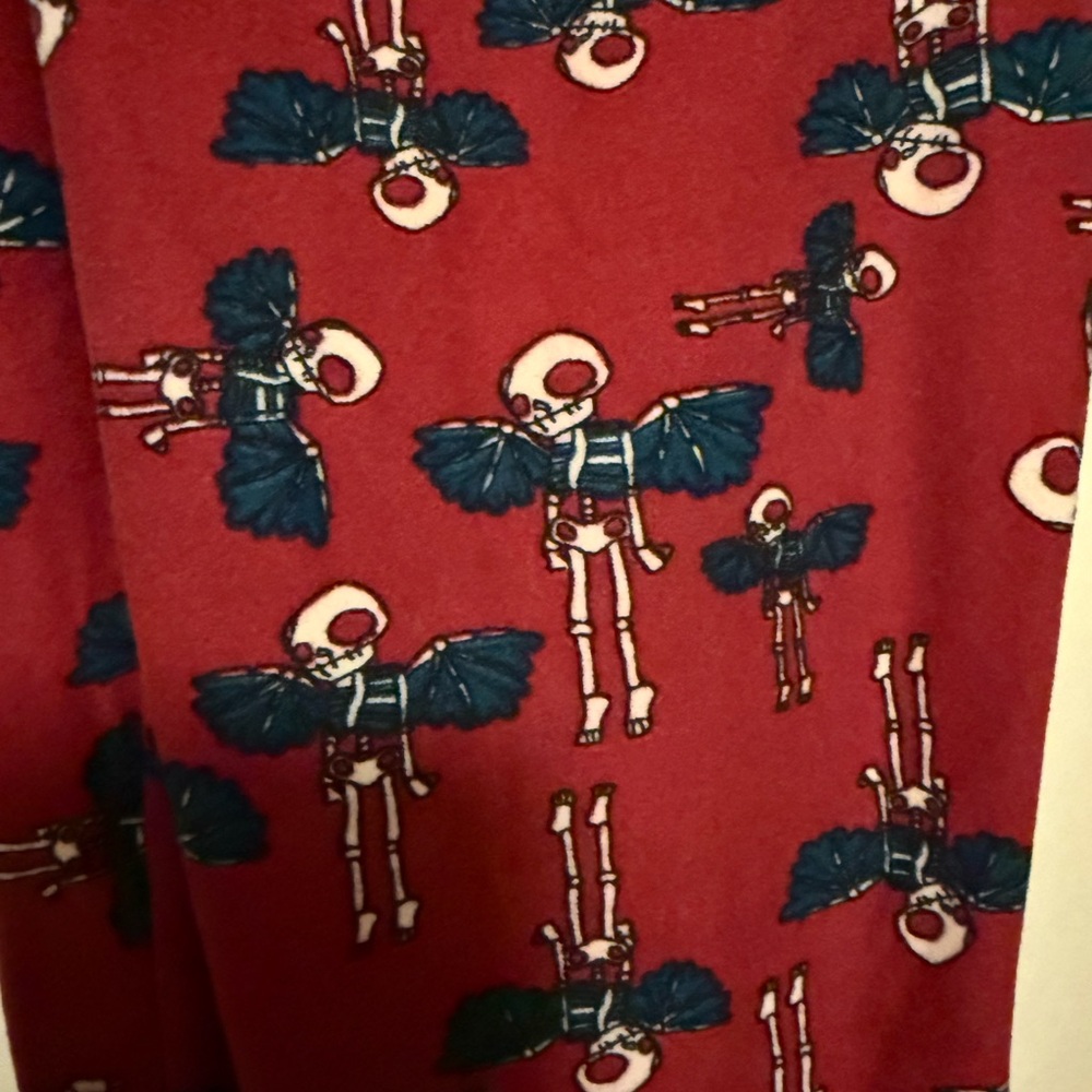 LuLaRoe Leggings with Red Winged Skeleton Design